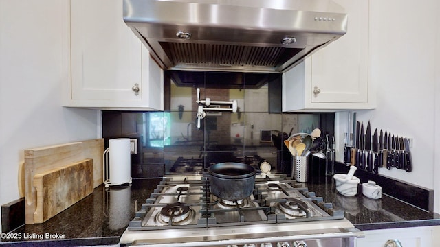 1223 S 1st St, Louisville, KY 40203 - kitchen with range hood, tasteful backsplash, white cabinetry, and dark stone counters