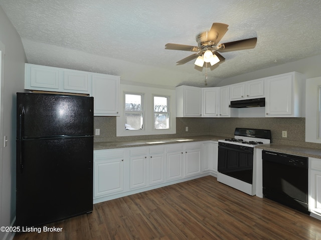 kitchen featuring black appliances, dark wood-style flooring, a textured ceiling, and under cabinet range hood