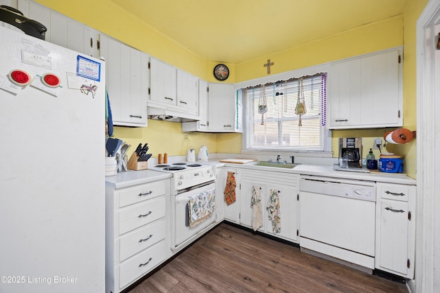 1042 Parkway Dr, Louisville, KY 40217 - kitchen featuring light countertops, under cabinet range hood, white appliances, and a sink