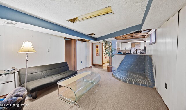 1042 Parkway Dr, Louisville, KY 40217 - carpeted living area featuring visible vents and a textured ceiling