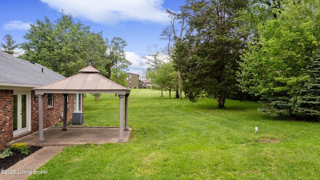1614 W Reel Dr, La Grange, KY 40031 - view of grassy yard with a gazebo, a patio, and central AC