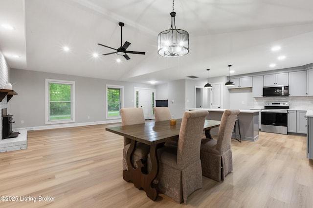 1614 W Reel Dr, La Grange, KY 40031 - dining room with light wood-style flooring, recessed lighting, a chandelier, a ceiling fan, and baseboards