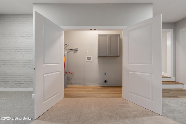 1614 W Reel Dr, La Grange, KY 40031 - clothes washing area with washer hookup, hookup for an electric dryer, cabinet space, and light colored carpet