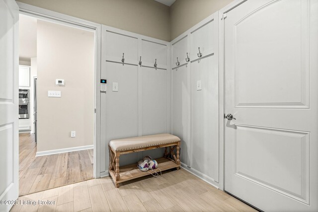 4107 Cobblestone Ln, La Grange, KY 40031 - mudroom featuring baseboards and light wood-type flooring