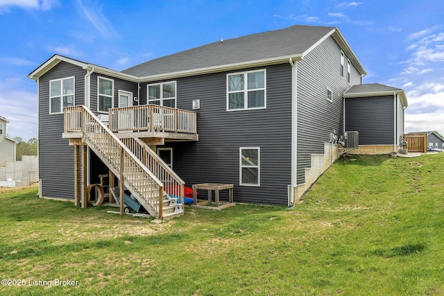 4107 Cobblestone Ln, La Grange, KY 40031 - rear view of house featuring stairway, a deck, central AC, and a lawn