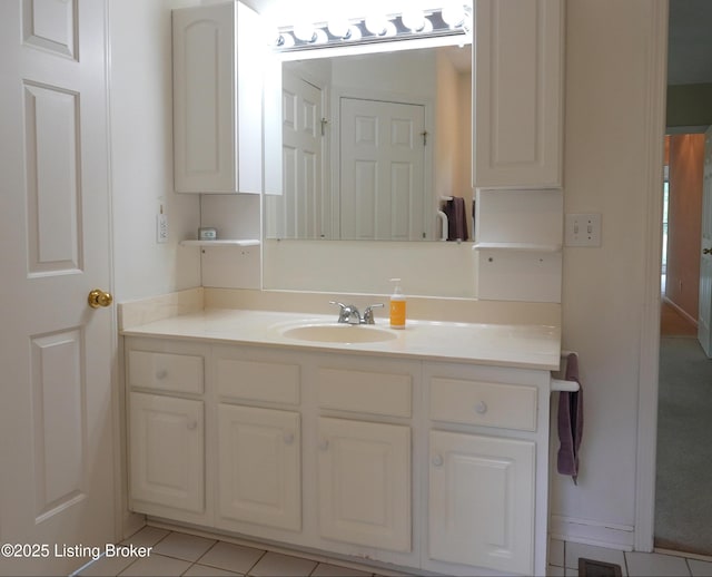 bathroom featuring vanity and tile patterned floors