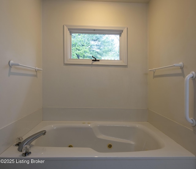 bathroom featuring a whirlpool tub