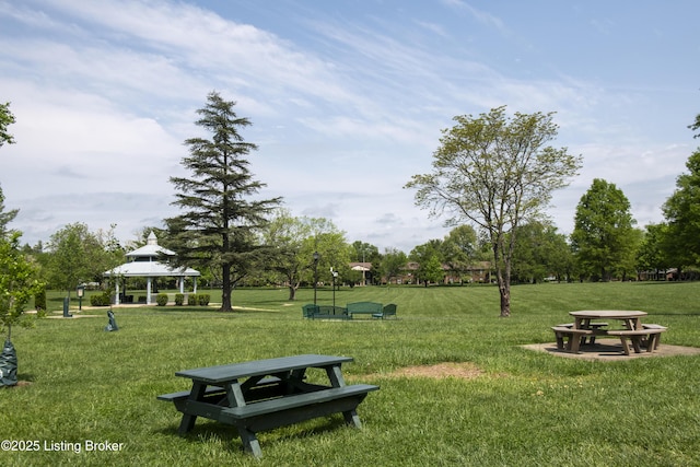 view of community with a gazebo and a yard