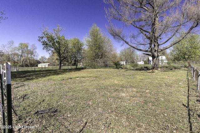 view of yard featuring fence