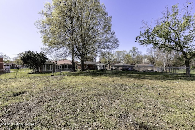 view of yard featuring fence