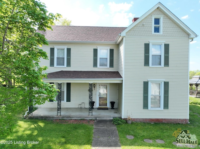 116 Lebanon Hl, Springfield, KY 40069 - view of front of property with covered porch, roof with shingles, a chimney, and a front yard