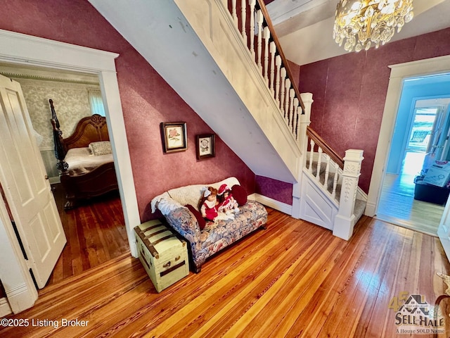 116 Lebanon Hl, Springfield, KY 40069 - interior space with stairs, lofted ceiling, a chandelier, and hardwood / wood-style flooring