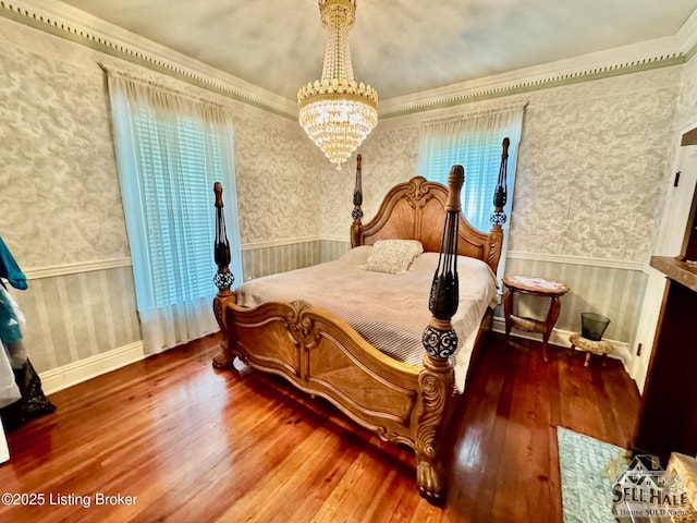 116 Lebanon Hl, Springfield, KY 40069 - bedroom with an inviting chandelier, wallpapered walls, and hardwood / wood-style floors