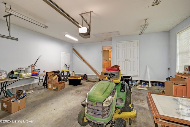 garage featuring a garage door opener