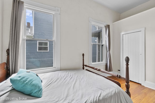 612 E Ormsby Ave, Louisville, KY 40203 - bedroom with wood finished floors and baseboards