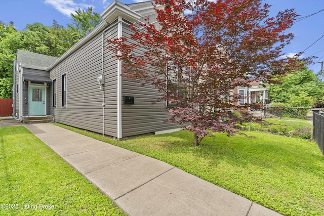 612 E Ormsby Ave, Louisville, KY 40203 - view of home's exterior with entry steps and a shingled roof