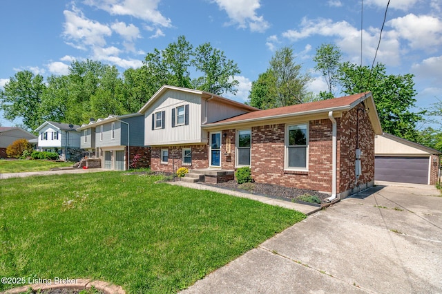 tri-level home with brick siding, a garage, an outbuilding, and a front yard