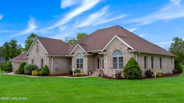 15815 Crystal Valley Way, Louisville, KY 40299 - view of front of house with a front yard, brick siding, and roof with shingles
