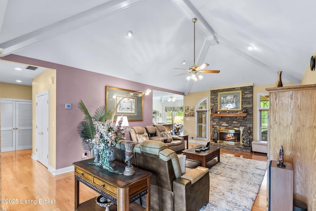 15815 Crystal Valley Way, Louisville, KY 40299 - living area with ceiling fan, light wood-style flooring, a stone fireplace, and baseboards