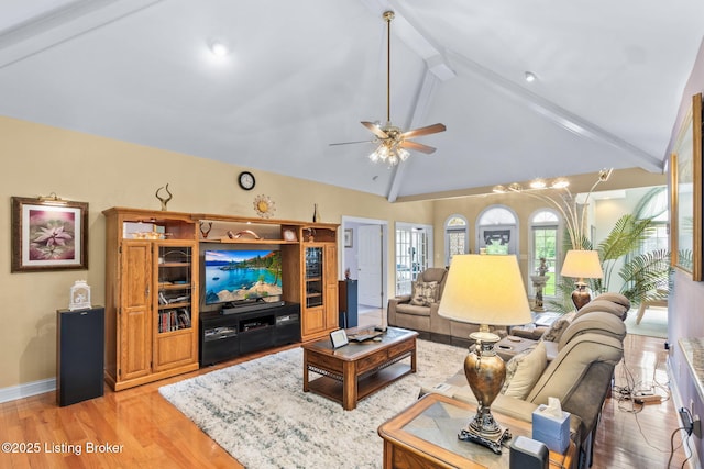 15815 Crystal Valley Way, Louisville, KY 40299 - living area featuring beam ceiling, ceiling fan, light wood-style flooring, baseboards, and high vaulted ceiling