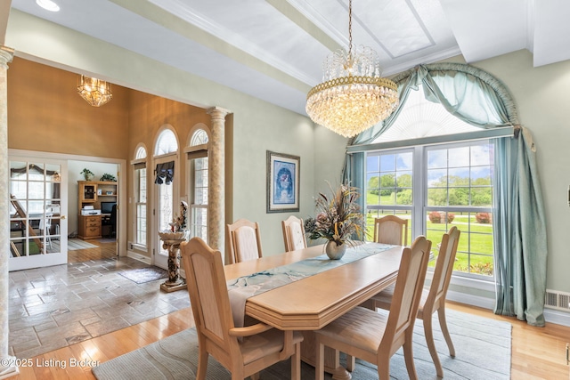 15815 Crystal Valley Way, Louisville, KY 40299 - dining area with a chandelier, healthy amount of natural light, ornamental molding, a high ceiling, and decorative columns