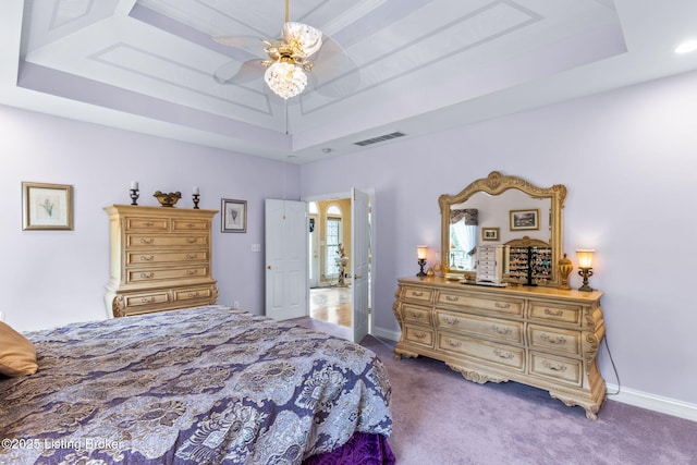 15815 Crystal Valley Way, Louisville, KY 40299 - carpeted bedroom featuring a tray ceiling, baseboards, and a ceiling fan