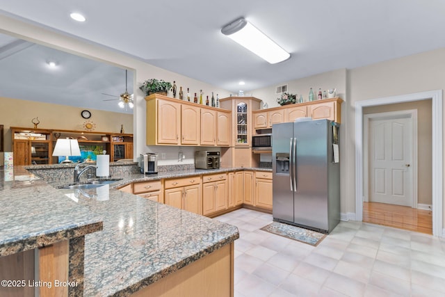 15815 Crystal Valley Way, Louisville, KY 40299 - kitchen featuring appliances with stainless steel finishes, a sink, light brown cabinets, a ceiling fan, and stone countertops