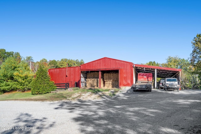 view of pole building with a detached carport