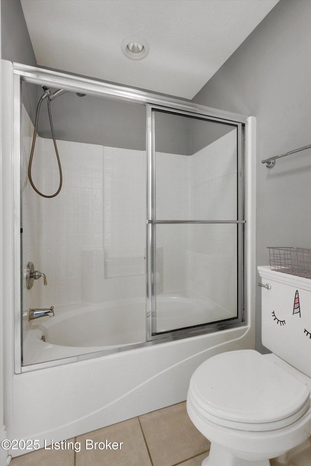302 Hampton Rd, Brandenburg, KY 40108 - bathroom featuring combined bath / shower with glass door, tile patterned floors, and toilet