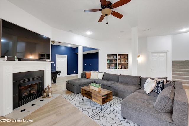 302 Hampton Rd, Brandenburg, KY 40108 - living room featuring recessed lighting, light wood-type flooring, a ceiling fan, and stairs