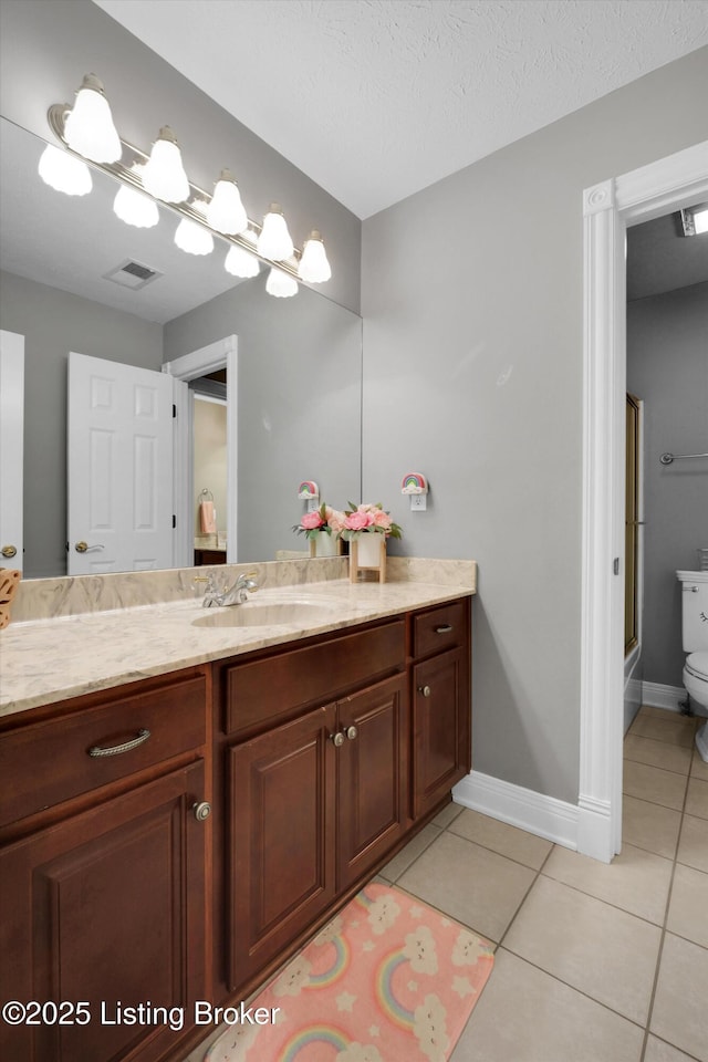 302 Hampton Rd, Brandenburg, KY 40108 - bathroom with visible vents, walk in shower, tile patterned floors, vanity, and toilet