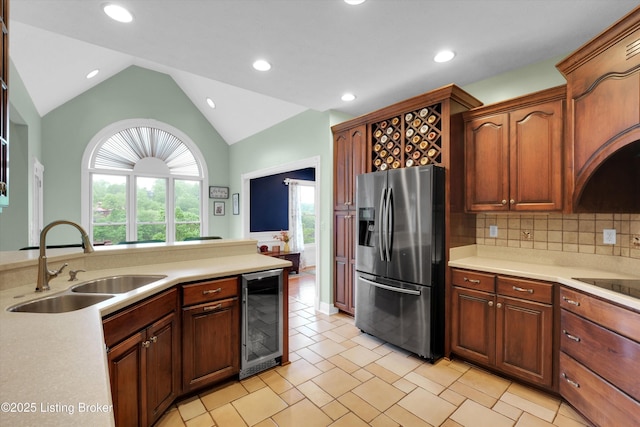 302 Hampton Rd, Brandenburg, KY 40108 - kitchen featuring vaulted ceiling, a sink, stainless steel fridge with ice dispenser, light countertops, and beverage cooler