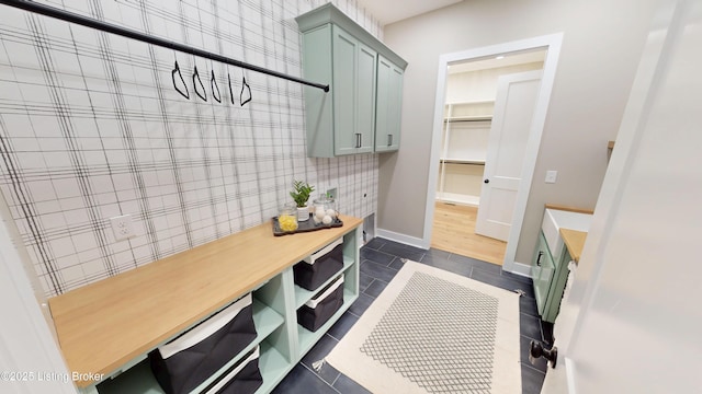 2045 W Rhudes Creek Rd, Elizabethtown, KY 42701 - mudroom with baseboards and dark tile patterned flooring