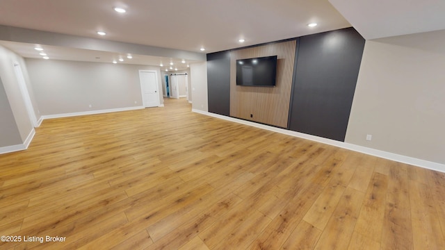 2045 W Rhudes Creek Rd, Elizabethtown, KY 42701 - finished below grade area featuring light wood-style floors, recessed lighting, and baseboards