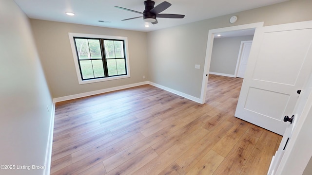 2045 W Rhudes Creek Rd, Elizabethtown, KY 42701 - spare room with visible vents, baseboards, ceiling fan, recessed lighting, and light wood-type flooring