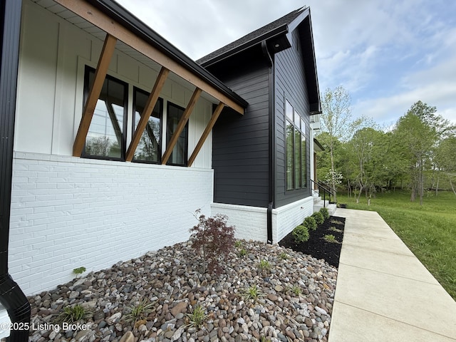 2045 W Rhudes Creek Rd, Elizabethtown, KY 42701 - view of side of property featuring a yard and brick siding