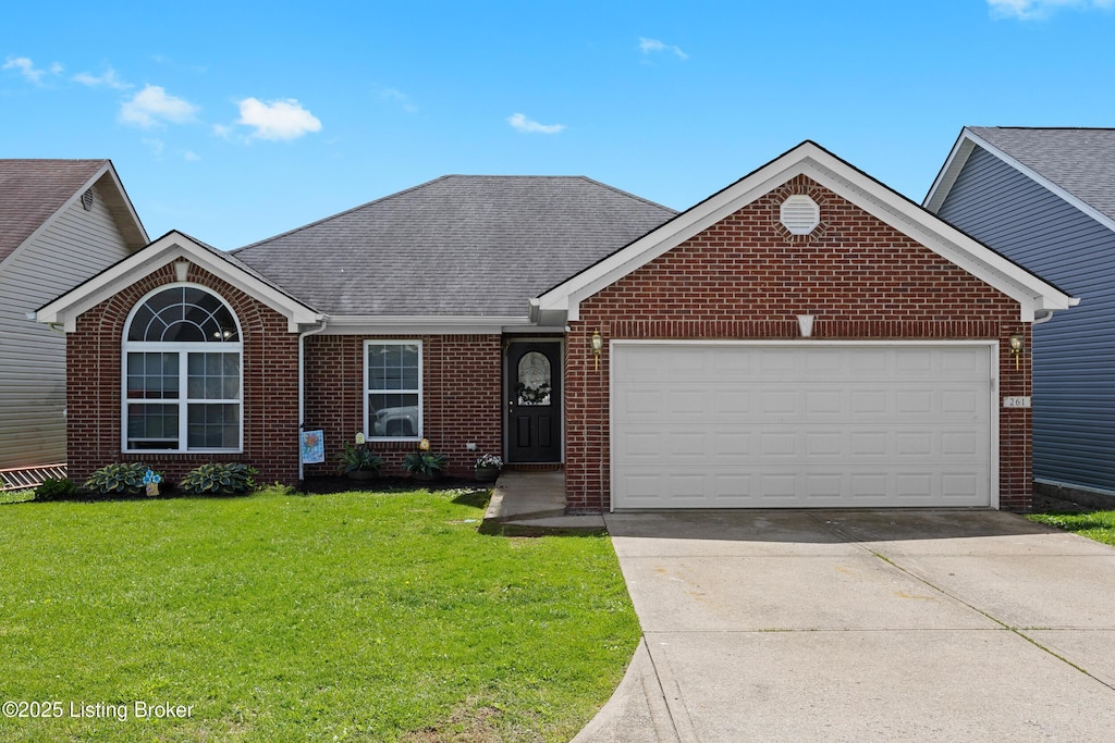 261 Palmer Dr, Frankfort, KY 40601 - ranch-style house with brick siding, concrete driveway, a shingled roof, a front lawn, and an attached garage