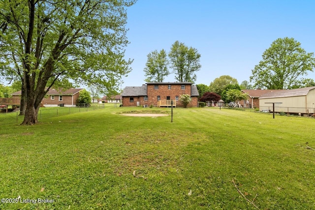 view of yard featuring fence