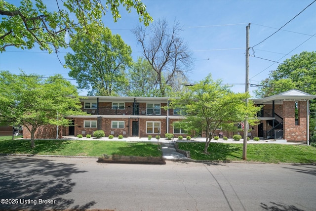 2100 Murray Ave, Louisville, KY 40205 - multi unit property featuring brick siding and a front yard
