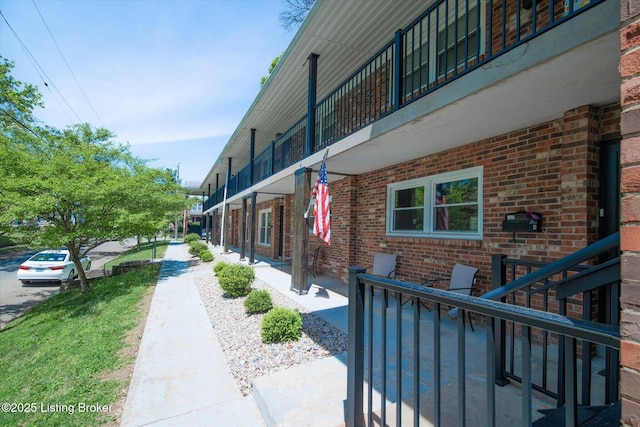 2100 Murray Ave, Louisville, KY 40205 - view of home's exterior featuring brick siding and a balcony