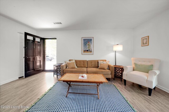 2100 Murray Ave, Louisville, KY 40205 - living room featuring light wood-style floors and baseboards