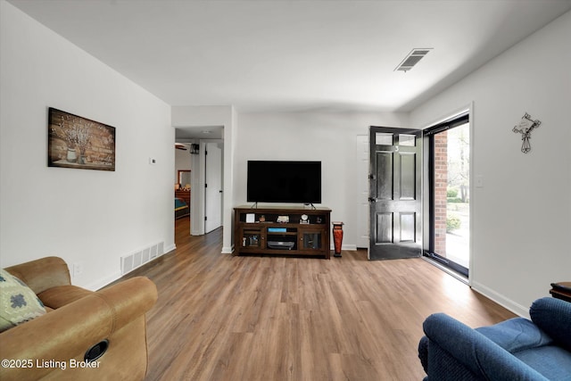 2100 Murray Ave, Louisville, KY 40205 - living area with light wood-type flooring and baseboards