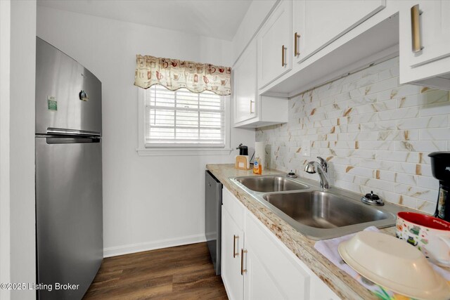 2100 Murray Ave, Louisville, KY 40205 - kitchen with freestanding refrigerator, a sink, decorative backsplash, white cabinetry, and light countertops