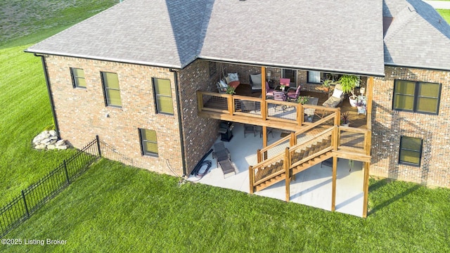 157 Tommy Ct, Shepherdsville, KY 40165 - rear view of property with roof with shingles, a fenced backyard, a deck, and brick siding