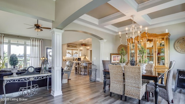 157 Tommy Ct, Shepherdsville, KY 40165 - dining space featuring arched walkways, decorative columns, and a wealth of natural light