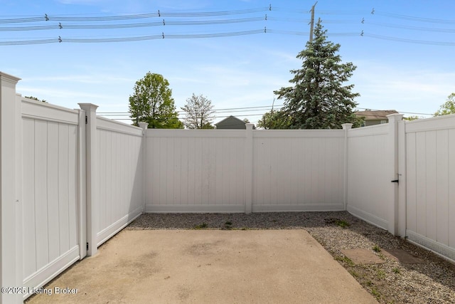 view of patio with fence