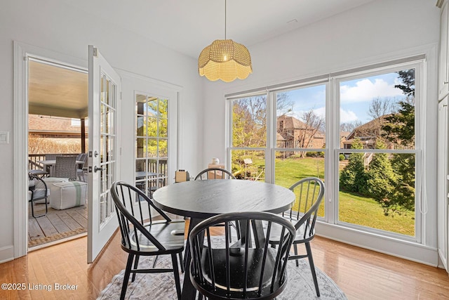 1203 Winding Creek Pl, Louisville, KY 40245 - dining space with french doors and light wood finished floors