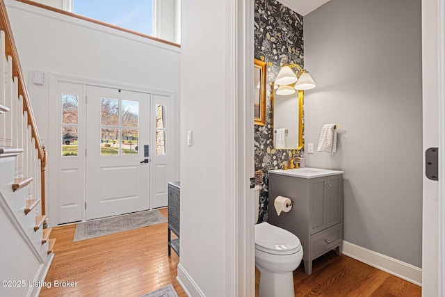 1203 Winding Creek Pl, Louisville, KY 40245 - entryway featuring light wood-type flooring, baseboards, and stairway