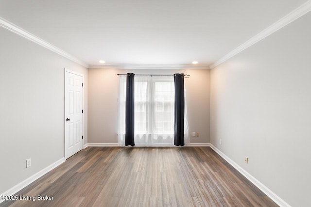 empty room featuring ornamental molding, baseboards, recessed lighting, and wood finished floors
