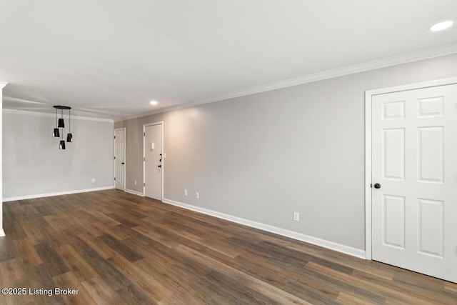 unfurnished living room featuring baseboards, dark wood finished floors, and recessed lighting